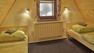 Posteľ alebo postele v izbe v ubytovaní Horský apartmán Draps