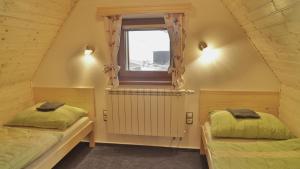 Posteľ alebo postele v izbe v ubytovaní Horský apartmán Draps
