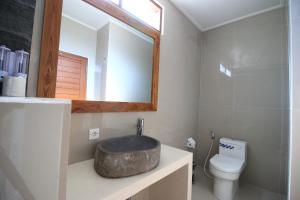 Koupelna v ubytování Kakol Homestay + 37 fotografií
