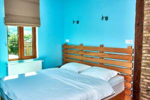 Voodi või voodid majutusasutuse Guest House Savane toas