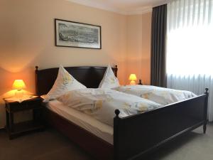 Postel nebo postele na pokoji v ubytování Hotel Mietz