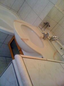 a bathroom with a sink and a bath tub at Hotel Line in Litvínov