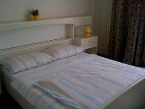 Llit o llits en una habitació de Hotel Line