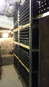 a rack of wine bottles in a wine cellar at Bed & Breakfast Fuocomuorto in Ercolano