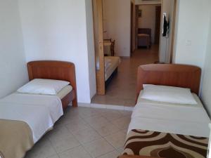 Postel nebo postele na pokoji v ubytování Apartments Toma Bajnice Directly
