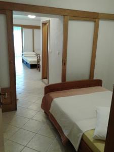Postel nebo postele na pokoji v ubytování Apartments Toma Bajnice Directly