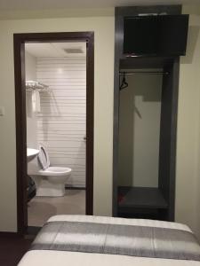 Koupelna v ubytování Check Inn Hotel Tawau