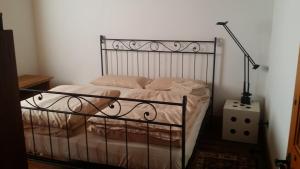 Ένα ή περισσότερα κρεβάτια σε δωμάτιο στο Scuderia 100 pertiche