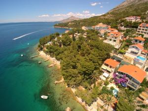 an aerial view of a small island in the water at Villa Raljević in Stanići