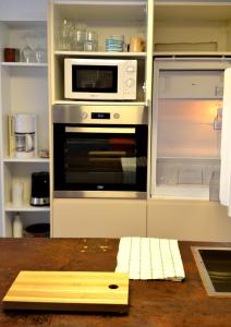 A kitchen or kitchenette at Apartment Center