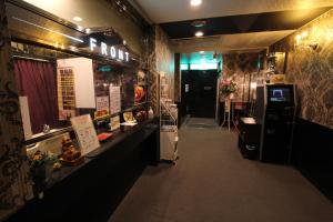 a store with a room with a sign on the wall at Lala Fleur (Adult Only) in Osaka