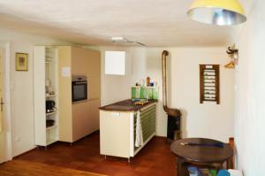 A kitchen or kitchenette at Apartment Center Még 14 kép