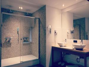 Ванная комната в Hotel du Commerce