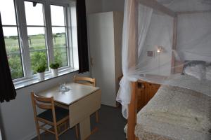 Postel nebo postele na pokoji v ubytování Henne Strand Ferie Accommodation