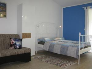 Postel nebo postele na pokoji v ubytování Apartments Reida