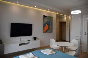 A television and/or entertainment centre at Apartament No.1