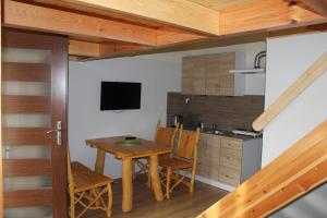 Kuchyňa alebo kuchynka v ubytovaní Apartamenty Górskie