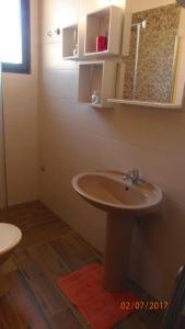 Kúpeľňa v ubytovaní Apartment Kika