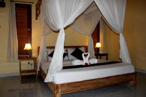 Katil atau katil-katil dalam bilik di Maha Neka Villa