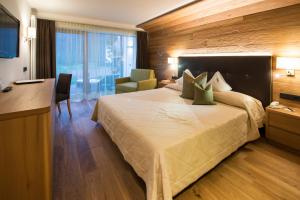Posteľ alebo postele v izbe v ubytovaní Hotel Grien