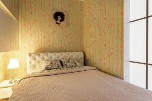 Giường trong phòng chung tại Apartment Gabriele in Old Town Vilnius