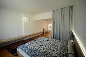 Llit o llits en una habitació de Architectural City Loft