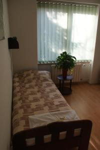 Łóżko lub łóżka w pokoju w obiekcie Hotel Monttis