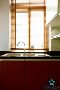 Η κουζίνα ή μικρή κουζίνα στο Angela Boutique Serviced Residence