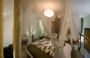 Posteľ alebo postele v izbe v ubytovaní Suites 13 Budapest