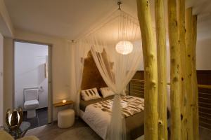 Posteľ alebo postele v izbe v ubytovaní Suites 13 Budapest