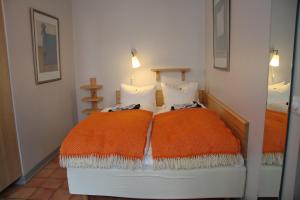 Letto o letti in una camera di Hotell Oskar