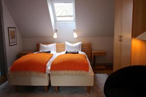 Letto o letti in una camera di Hotell Oskar