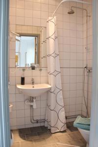 Koupelna v ubytování Hotell Oskar