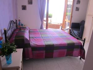 Cama o camas de una habitación en Verde Taormina