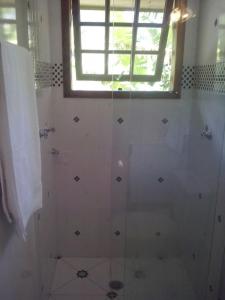 A bathroom at chales azaleia todos