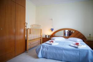 Posteľ alebo postele v izbe v ubytovaní Villa Romantika