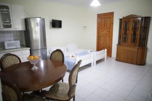 Televízia a/alebo spoločenská miestnosť v ubytovaní Villa Romantika