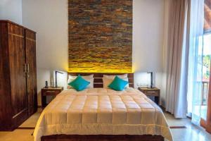 Ένα ή περισσότερα κρεβάτια σε δωμάτιο στο R Degrees Boutique Hotel & Spa