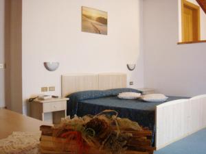 Postel nebo postele na pokoji v ubytování Hotel Siera Hof
