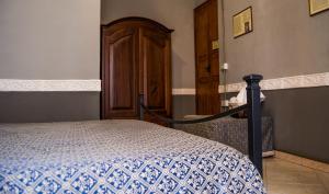 Ένα ή περισσότερα κρεβάτια σε δωμάτιο στο B&B Su Maimoni
