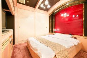 Postel nebo postele na pokoji v ubytování Hotel Luna (Adult Only)