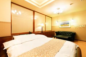 Postel nebo postele na pokoji v ubytování Hotel Luna (Adult Only)