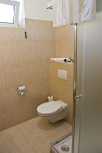 Koupelna v ubytování Hotel Kelep
