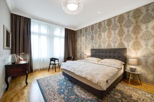 Postel nebo postele na pokoji v ubytování Bishop Apartments
