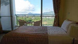 Letto o letti in una camera di Kuan Min B&B