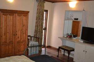 Kuchyň nebo kuchyňský kout v ubytování Foxwood House Boutique Hotel