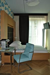 Postel nebo postele na pokoji v ubytování Amadi Park Hotel