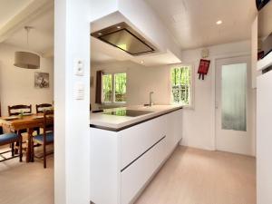 Wonderful Holiday Home in Beauaring with Sauna tesisinde mutfak veya mini mutfak