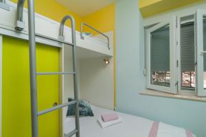Posteľ alebo postele v izbe v ubytovaní Split Center Apartment