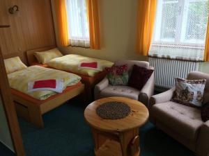 Postel nebo postele na pokoji v ubytování U Kapličky + 16 fotografií